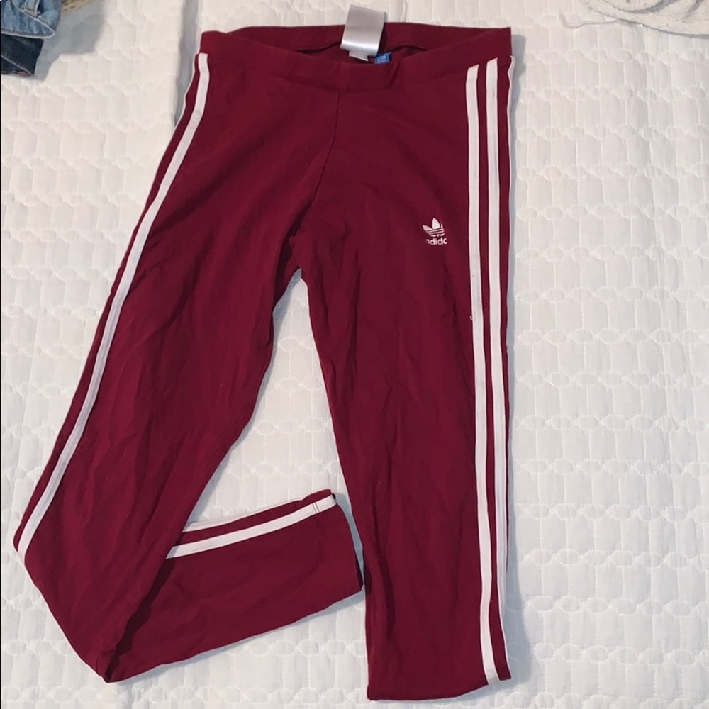 Maroon Adidas leggings.